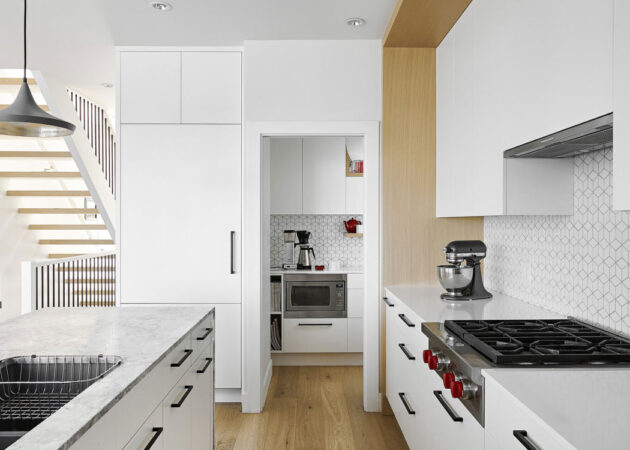 Kitchen renovation and cabinet maker in Melbourne white panel cabinet with marble stone